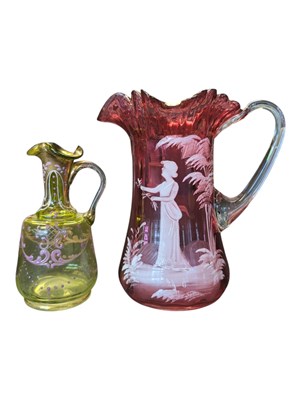Lot 64 - 19TH CENTURY VICTORIAN CRANBERRY GLASS MARY GREGORY FRILLED JUG & BOHEMIAN GREEN GLASS EWER