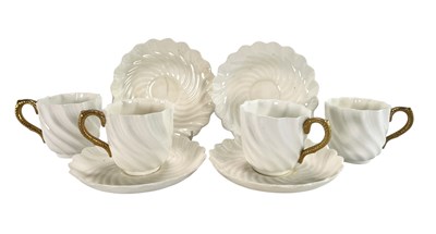 Lot 103 - FOUR COALPORT LATE 19TH CENTURY PARCEL GILT PORCELAIN COFFEE CUPS & SAUCERS