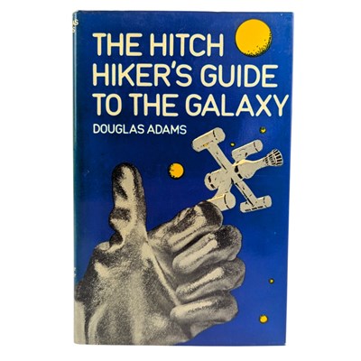 Lot 56 - ADAMS, DOUGLAS - 1979 THE HITCH HIKER'S GUIDE TO THE GALAXY - FIRST EDITION