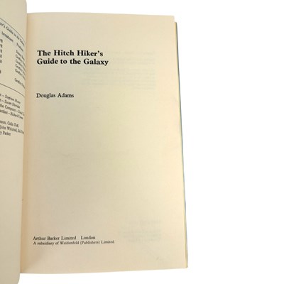 Lot 56 - ADAMS, DOUGLAS - 1979 THE HITCH HIKER'S GUIDE TO THE GALAXY - FIRST EDITION
