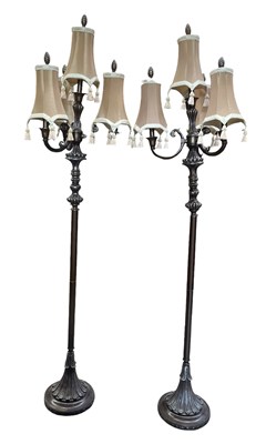 Lot 585 - PAIR OF CONTEMPORARY ECCLESIASTICAL MANNER BRONZED METAL FLOOR STANDARD LAMPS
