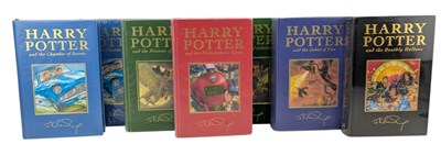 Lot 18 - ROWKING, J.K. - HARRY POTTER - SEVEN DELUXE EDITIONS
