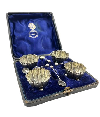 Lot 19 - CASED SET OF FOUR VICTORIAN HALLMARKED SILVER SALT CELLARS WITH SPOONS