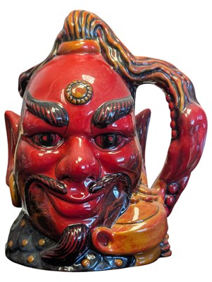 Lot 72 - ROYAL DOULTON FLAMBE - LATE 20TH CENTURY CERAMIC ALADDIN'S GENIE CHARACTER JUG