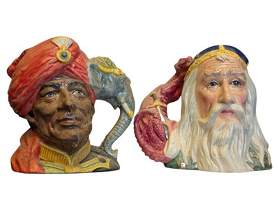 Lot 77 - ROYAL DOULTON - MERLIN / THE ELEPHANT TRAINER TWO CHARACTER JUGS