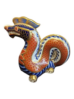 Lot 131 - ROYAL CROWN DERBY - 1988 BONE CHINA DRAGON SHAPED PAPERWEIGHT