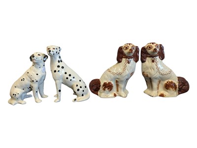 Lot 141 - A PAIR OF 20TH CENTURY STAFFORDSHIRE MANTEL DOGS & A PAIR OF DALMATIAN MANTEL DOGS