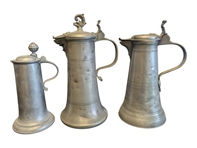 Lot 399 - THREE 18TH CENTURY GERMAN PEWTER FLAGONS / STITZENS