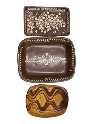 Lot 193 - THREE 20TH CENTURY SLIPWARE DISHES