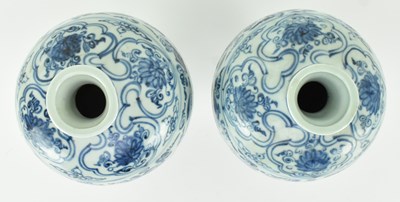 Lot 28 - PAIR OF MING BLUE AND WHITE MEIPING VASES 明 青花缠枝牡丹梅瓶一对