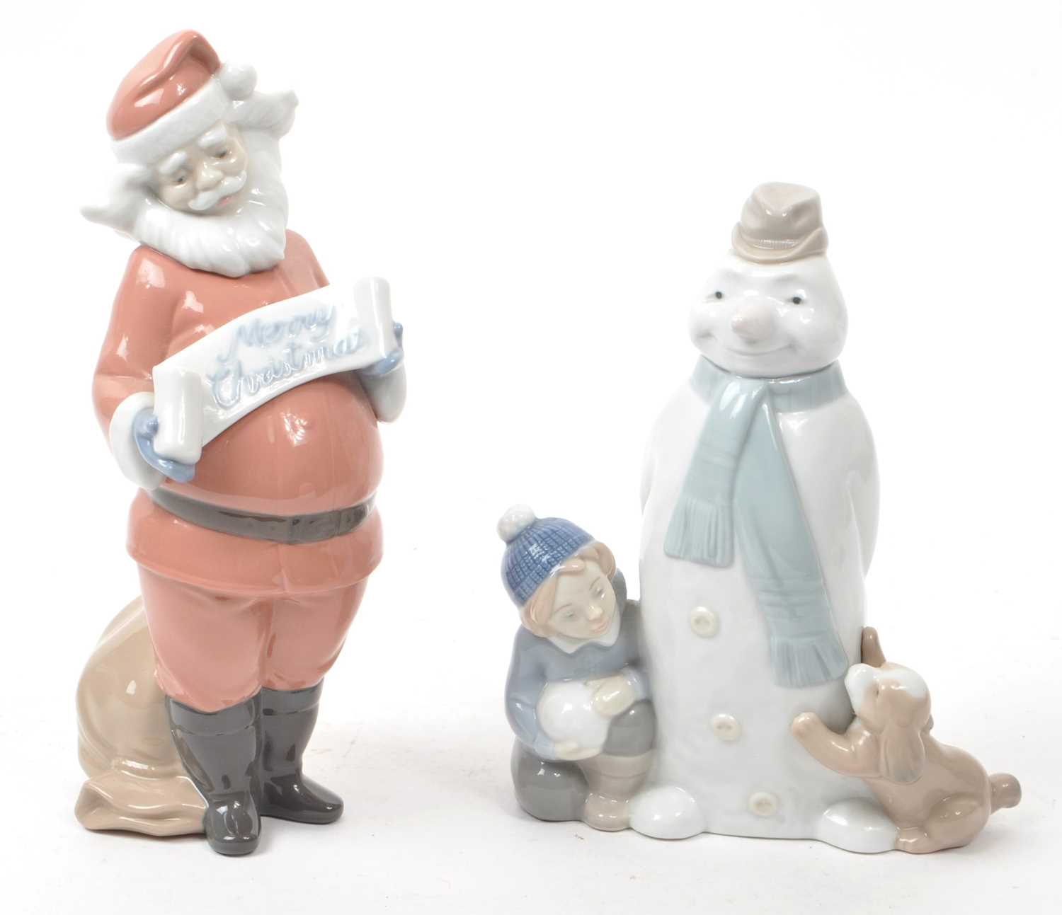 Lot 35 - NAO - LLADRO - TWO CONTEMPORARY PORCELAIN CHRISTMAS FIGURINES