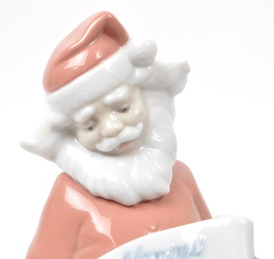 Lot 35 - NAO - LLADRO - TWO CONTEMPORARY PORCELAIN CHRISTMAS FIGURINES