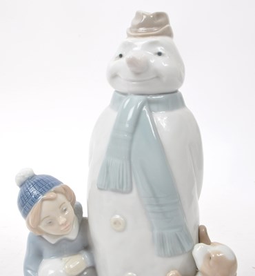 Lot 35 - NAO - LLADRO - TWO CONTEMPORARY PORCELAIN CHRISTMAS FIGURINES