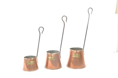 Lot 253 - SET OF THREE GRADUATING CIDER MEASURES