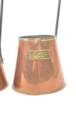 Lot 253 - SET OF THREE GRADUATING CIDER MEASURES