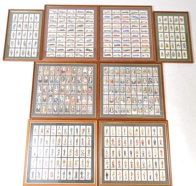 Lot 477 - A LARGE COLLECTION OF FRAMED AND GLAZED VINTAGE 2OTH CENTURY CIGARETTE CARDS