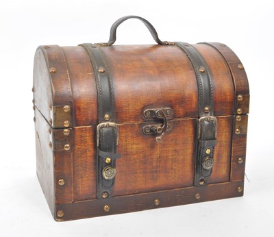 Lot 288 - CONTEMPORARY DOMED FAUX LEATHER STRAP CHEST