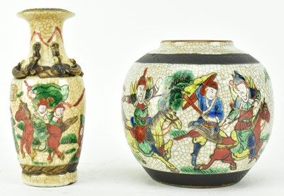 Lot 219 - TWO QING NANKING CRACKLED PIECES 清 仿哥窑广彩人物罐和小瓶